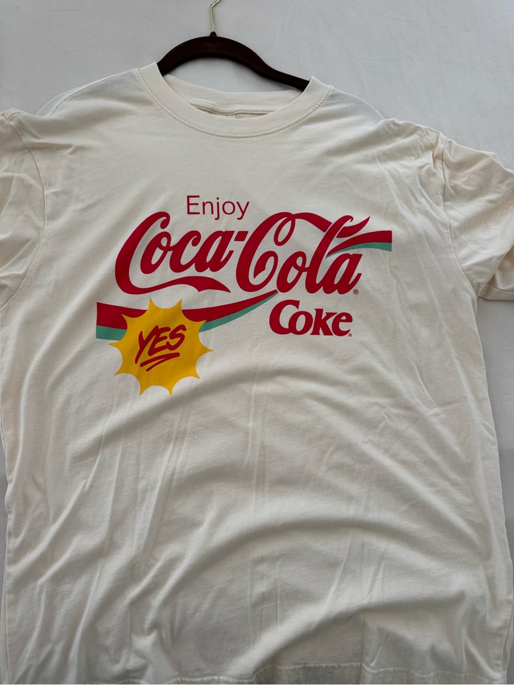 Coca-Cola x PacSun Cream Tee with Black and Red Tags